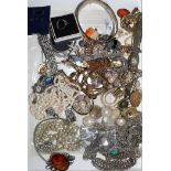 A quantity of silver and costume jewellery.