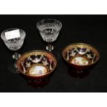 A pair of figurative decorated ruby bowls and a pair of cut glasses