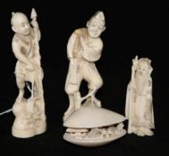 A Japanese ivory model of the Clam's Dream and three walrus ivory figures, early 20th century