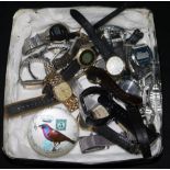 A quantity of watches and a paperweight.