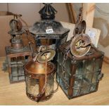 Four metal lanterns