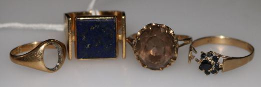 A gold and lapis lazuli ring and three 9ct gold rings (a.f.).