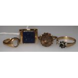 A gold and lapis lazuli ring and three 9ct gold rings (a.f.).