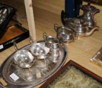 A four piece silver plated tea set tray and two sauceboats