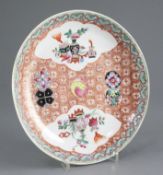 A Chinese famille rose dish, 19th century, Yongzheng mark, painted to shaped reserves with