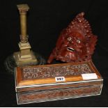 An Indian sandalwood box, a Chinese carved head and a model of a triumphal column