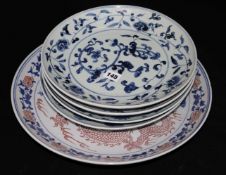 A dragon charger and four Chinese blue and white plates
