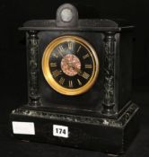 A black marble mantel clock