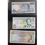 A collection of bank notes, including British Armed Forces