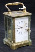 A gilt brass carriage clock by Henri Jacot, in leather travelling case, (a.f.)
