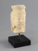 A Chinese marble head of a Bodhisattva, 15th century, in Northern Wei style, height 13cm, modern