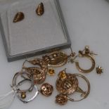 Ten pairs of assorted 9ct gold earrings and four single earrings.