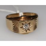 A 9ct gold and diamond set signet ring, size S.