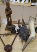 An African carved wood Mask, a Benin style bronze bust, a musical instrument, a horn and a wooden