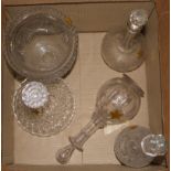 Four assorted cut glass decanters and a pedestal bowl