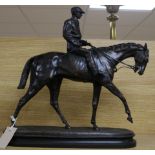 After Mene, a bronze figure of a horse and jockey, height 41cm