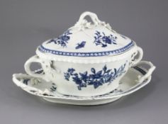 A Worcester lozenge shaped tureen cover and stand, c.1775, blue printed in the three flowers