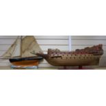 A model of the hull of a galleon and a pond yacht 97cm and 74cm