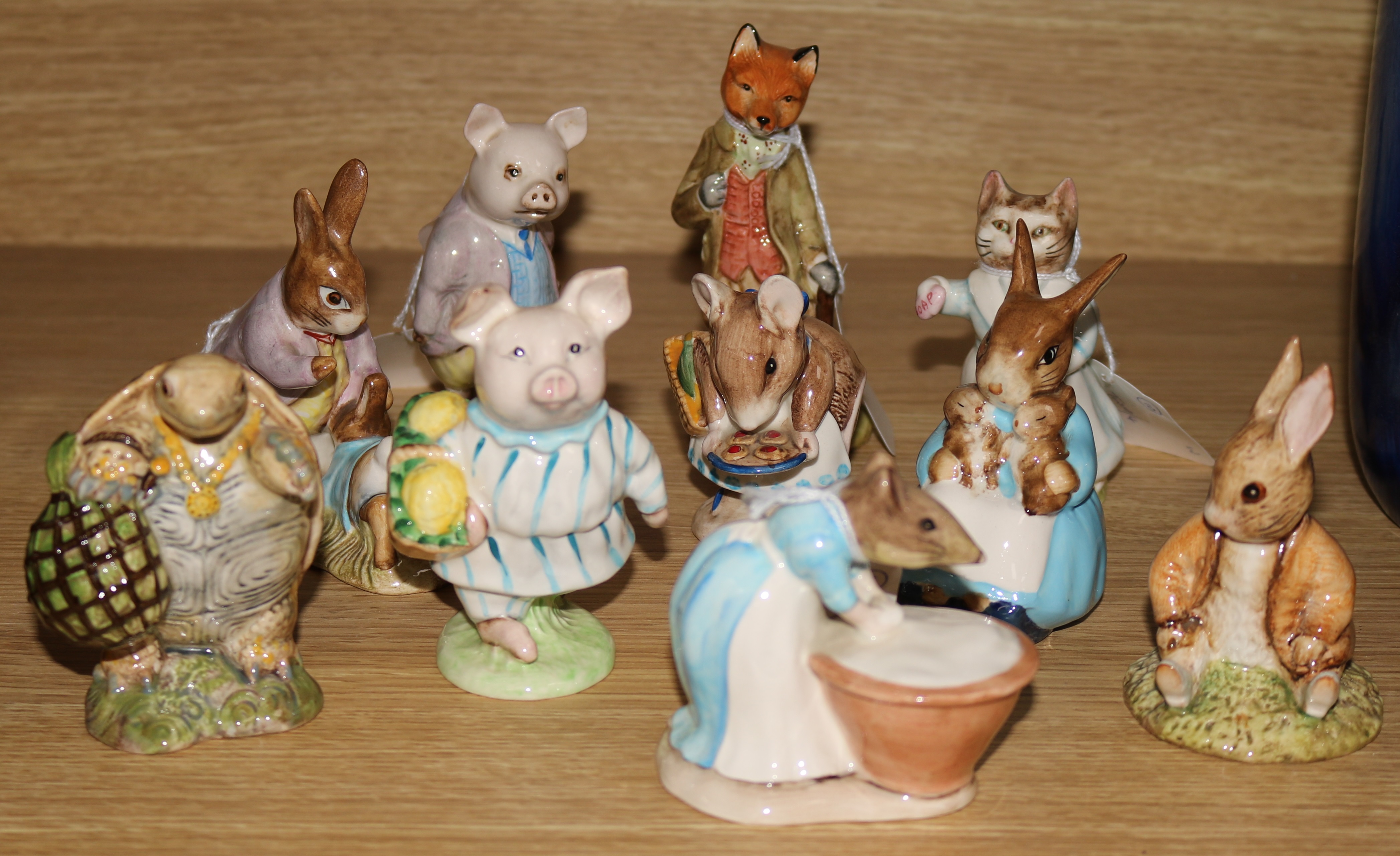 A collection of ten Beswick Beatrix Potter figures, including Anna Maria, BP-3a, Appley Dapply, BP-