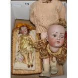 A Simon & Halbig bisque head doll, no.117 and a Kamer & Reinhardt doll, 23cm