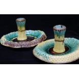 Two majolica bread dishes and a pair of vases