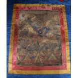 A Tibetan thangka, the central panel 15 x 11in.