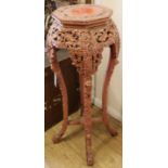 A Chinese red painted hardwood jardiniere stand, H.92cm
