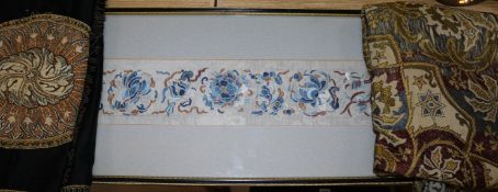 A Chinese silk embroidered sleeve panel, a European table centrepiece and a table cloth