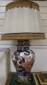 A large brass mounted Imari vase table lamp, overall height incl. shade 35in.