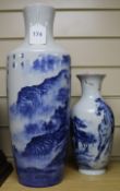 A Chinese blue and white baluster vase, decorated with a landscape, and another vase decorated