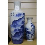 A Chinese blue and white baluster vase, decorated with a landscape, and another vase decorated
