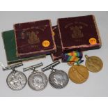 Four crowns, 1902, 1935 & 1951 x 2 and four World War I medals.