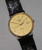 A gentleman's Longines 9ct gold quartz wrist watch.