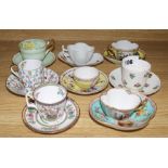 A collection of eight assorted cabinet cups and saucers