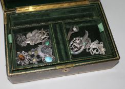 A quantity of costume jewellery including silver brooch and marcasite jewellery.