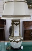 A French blanc de chine and gilt metal-mounted table lamp, height 32in.