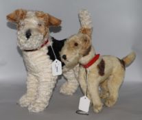 A Steiff 'Foxy' Fox Terrier, model no. 931717, height 13.5ins (button in ear) and another smaller
