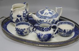 A Willow pattern tea tray and five other blue and white items