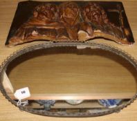 A plaster relief plaque of Jesus, Mary and John The Baptist, and a mirrored table centrepiece,