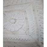 A crochet bed throw