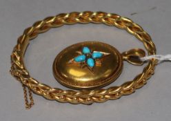 A 9ct gold bead and fancy link hollow hinged bangle and a yellow metal oval mourning pendant, with