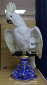 A Vienna porcelain model of a perched cockatoo, 16in. (a.f.)