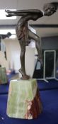 An Art Deco cold-painted bronze figure of a semi-nude Egyptian dancer, on onyx pedestal