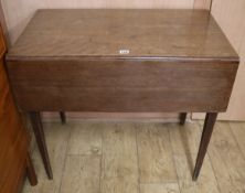 A George III mahogany Pembroke table, fitted drawer and dummy drawer, W.82cm