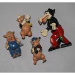 Four Disney pre-war hollow cast figures, Three Little Pigs and the Big Bad Wolf (damage and