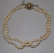 A 1960's double strand cultured pearl necklace with 9ct gold, cultured pearl and turquoise set