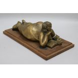 Jean Doyle. A bronze figure of a sunbather, 'Barbara', overall 14.75in.