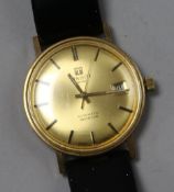A gentleman's gold Tissot Seastar automatic wrist watch.