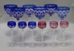 A set of six Bohemian blue overlaid glass hocks and six assorted liqueur glasses
