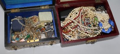 A quantity of assorted costume jewellery in two boxes.